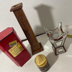 Lot of incense burners with incense.